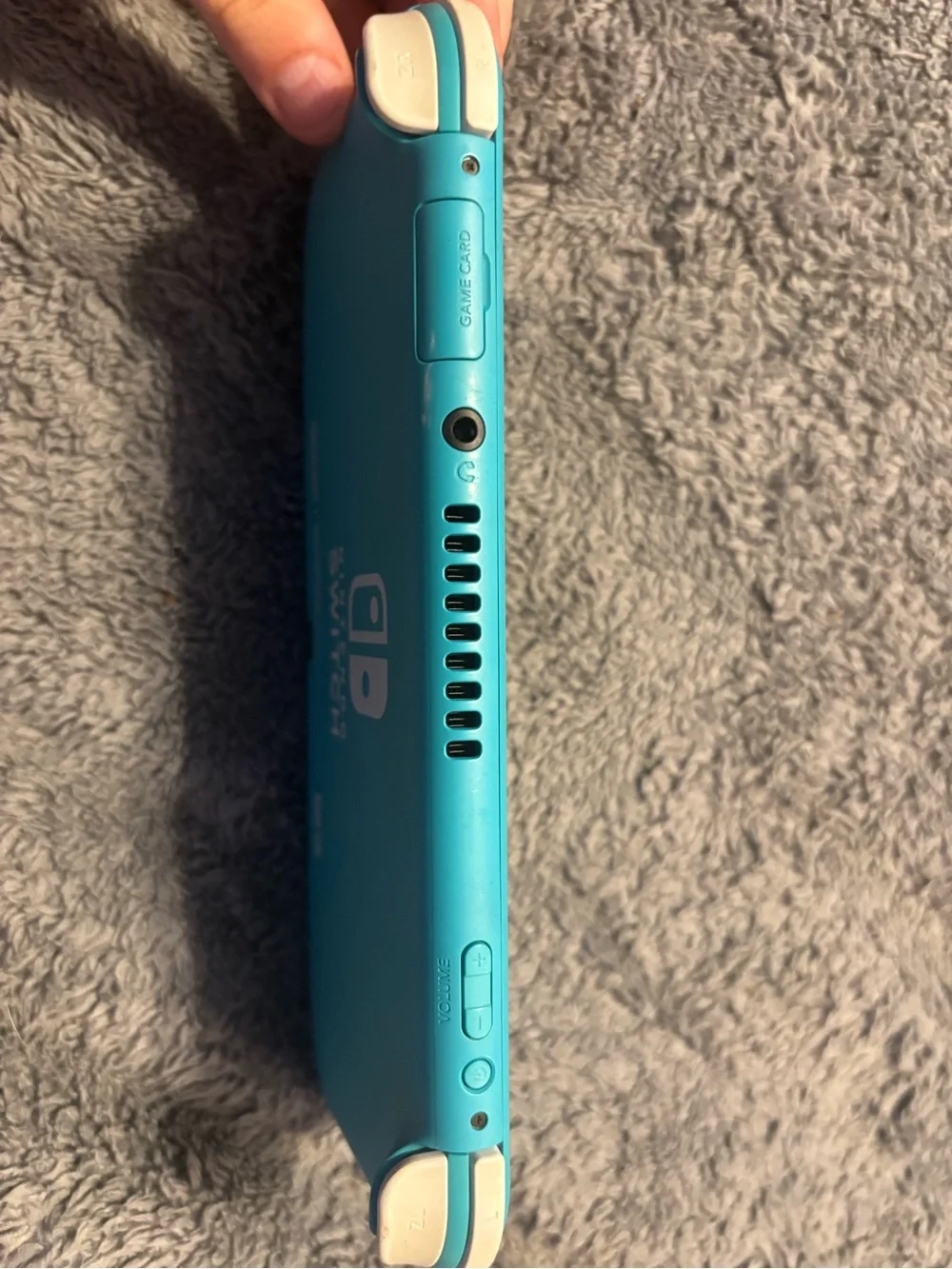 Nintendo Turquoise Handheld Gaming Console
